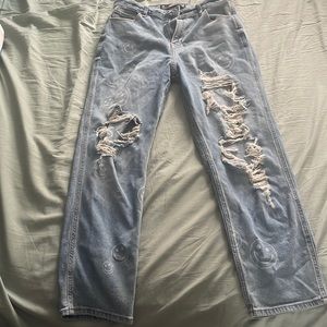 Hollister jeans, distressed with smiley faces